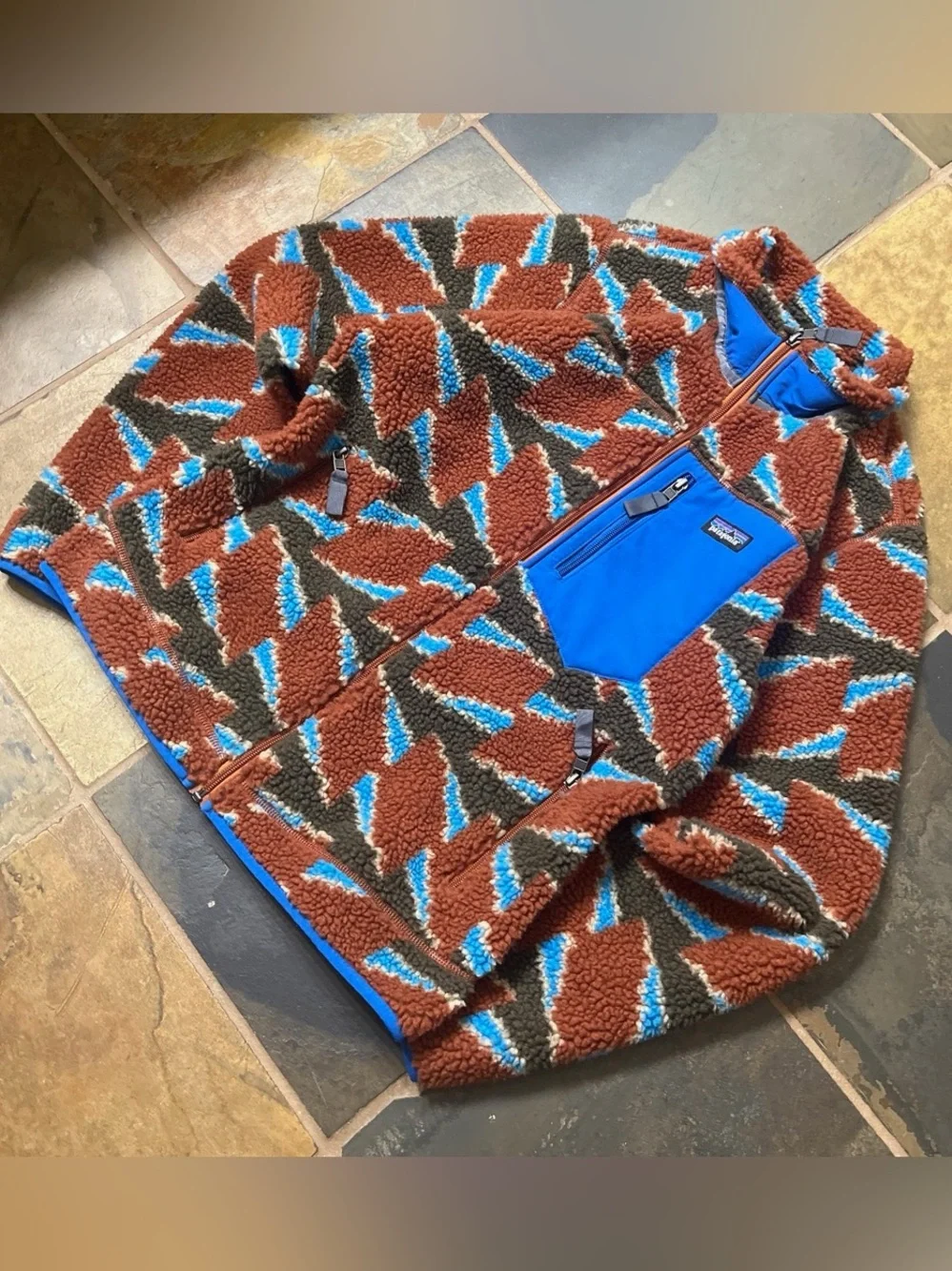 Patagonia sherpa fleece jacket in bright blue and brown pattern